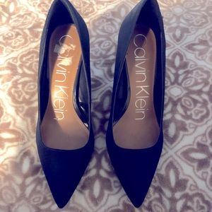 Navy blue CK heels. Very comfortable like new. Only used once